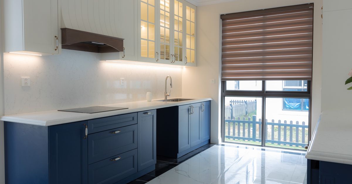Kitchen cabinet and countertop inspection during property handover